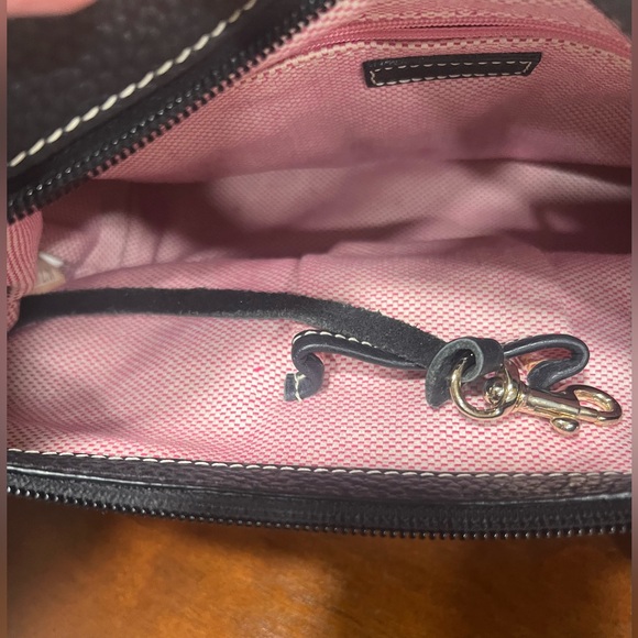 Dooney & Burke black logo printed fabric with black pebbled leather accents. - Picture 8 of 9